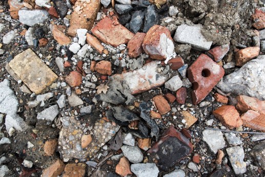 Bricks and concrete are all that remains of homes that used to stand on 57th Street. (Photo by Max Herman)