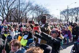 A crowd several times larger than expected gathered to see speakers at a Grant Park rally organized to kick off the Women’s March on Chicago.