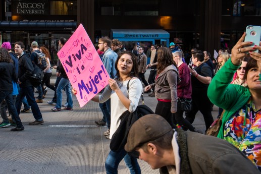 Women’s March on Chicago attendees walk down Michigan Avenue towards Trump Tower. Although the planned march to Federal Plaza was officially called off by organizers due to the size of the crowd, thousands marched anyways throughout downtown Chicago.