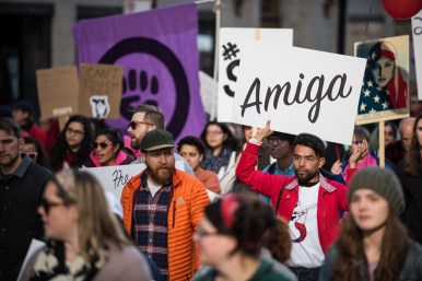 Tens of thousands of people carried signs throughout downtown Chicago after the Women’s March on Chicago rally in Grant Park.